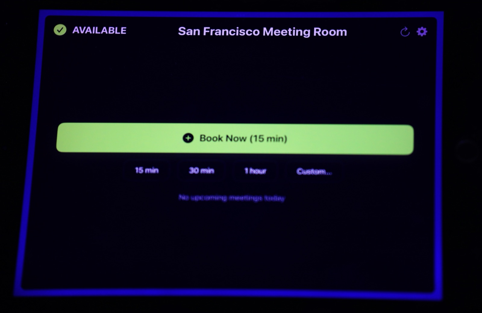 The Room Display staying lit on an iPad in a darkened room